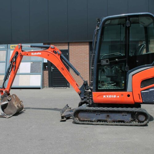 2 tons minigraver met bak